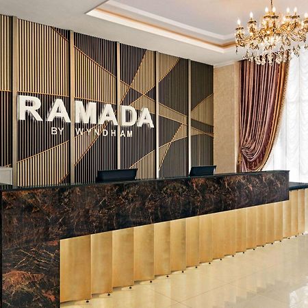 Hotel Ramada By Wyndham Chimkent Extérieur photo