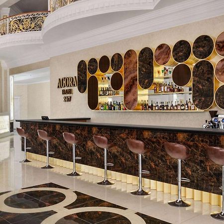 Hotel Ramada By Wyndham Chimkent Extérieur photo