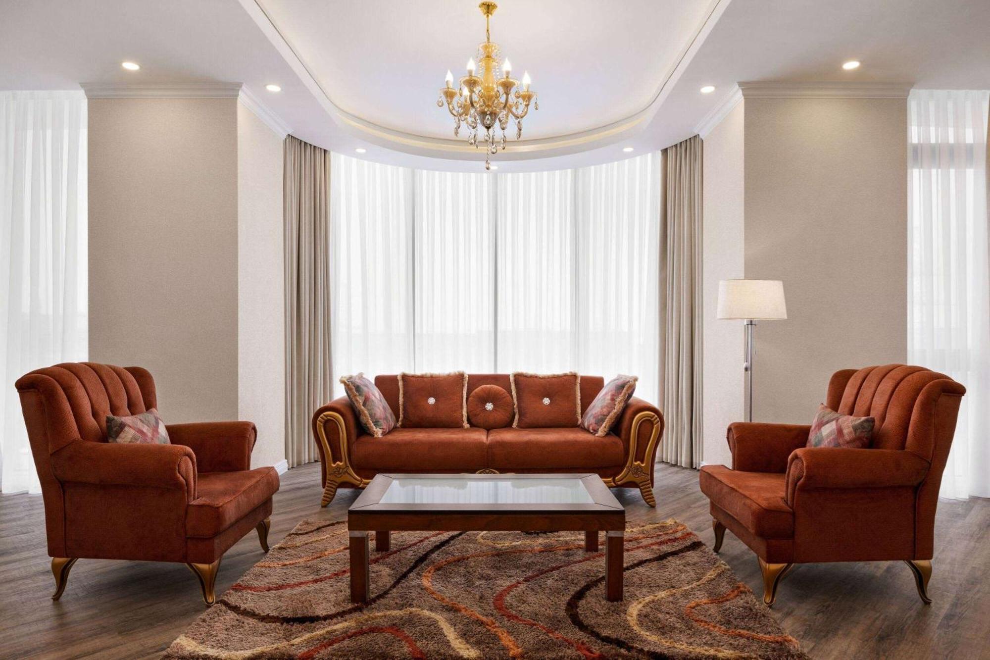 Hotel Ramada By Wyndham Chimkent Extérieur photo