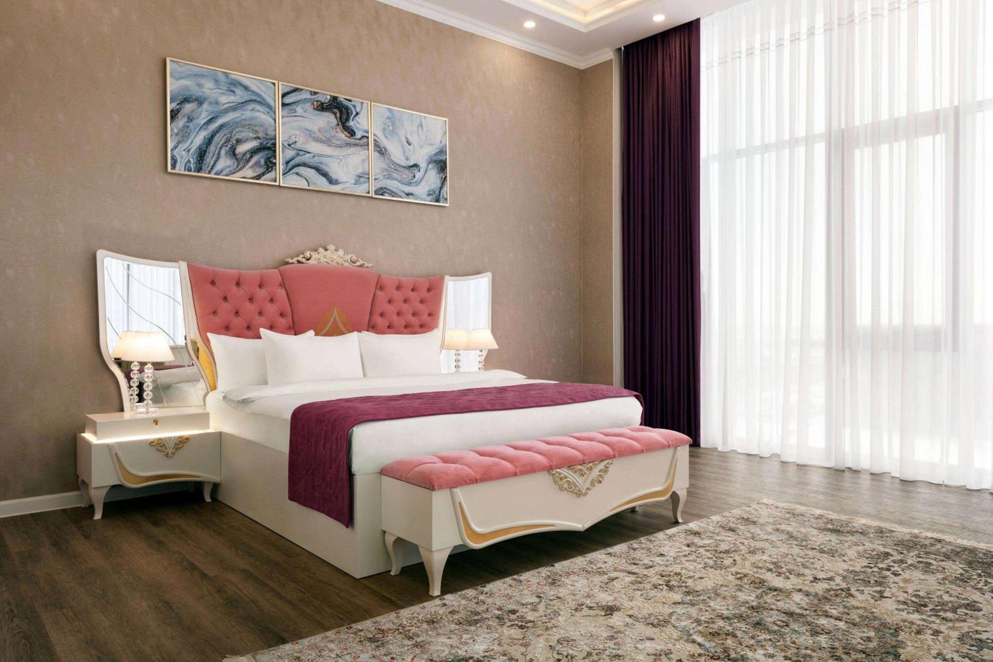 Hotel Ramada By Wyndham Chimkent Extérieur photo